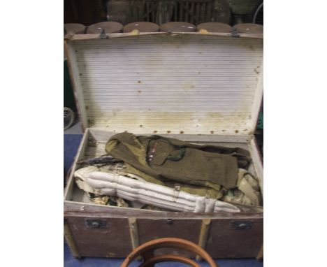 A Travelling Trunk Containing Various Items of Army Uniform, Newspapers, Cricket Pads and Gurkha Knife.