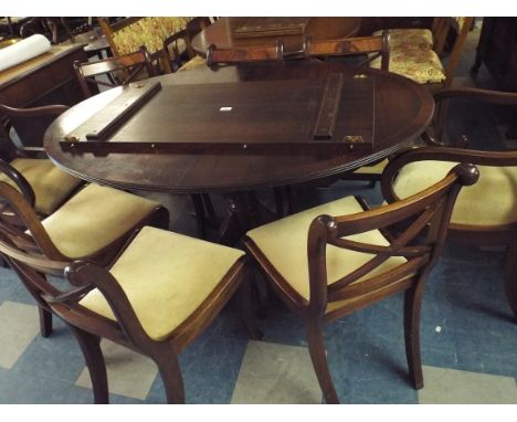 A Reproduction Twin Pedestal Table and 6 Chairs