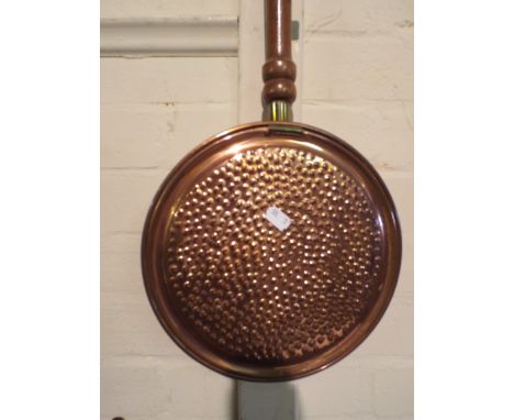 A Copper Bed Warming Pan.