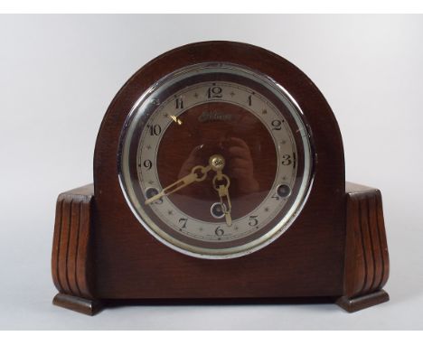 An Oak Westminster Chime Mantle Clock.