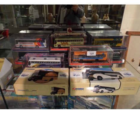 A Collection of 17 Boxed Corgi Buses and Wagons. 