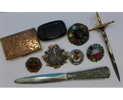 A Royal Selangor letter opener, a clover musical powder compact, Miracle brooches and a horn snuff box