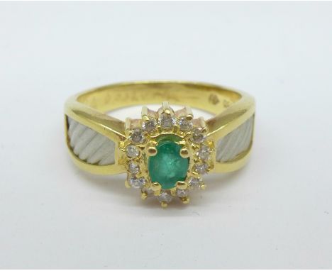 An 18ct gold, emerald and diamond ring, 5.9g, R