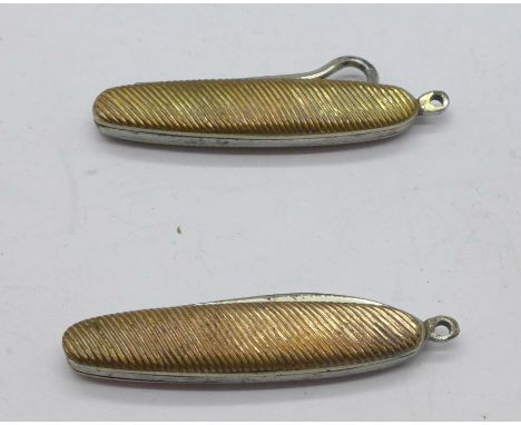 A penknife and a button hook fob