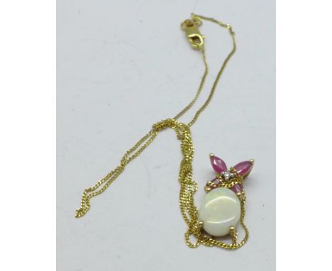 A 9ct gold, opal, diamond and ruby pendant