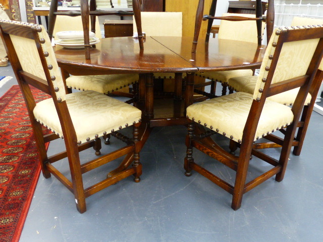 A GOOD QUALITY BESPOKE OAK EXTENDING DINING TABLE WITH SIX ...