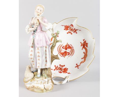 A MID 19TH CENTURY MEISSEN FIGURE OF A SHEPHERDESS playing a pipe (minor chipping), and a 20th century Dragon pattern leaf sh