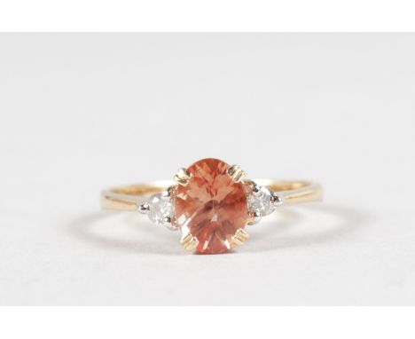 A 14CT YELLOW GOLD, TOURMALINE AND DIAMOND RING.