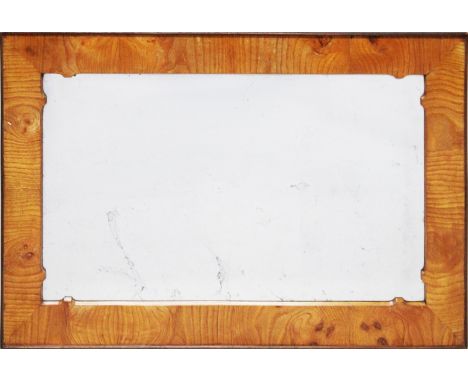 AN 18TH CENTURY WALNUT FRAMED MIRROR. 2ft 5ins high, 1ft 7ins wide.