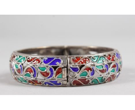 A SILVER AND ENAMEL BANGLE.