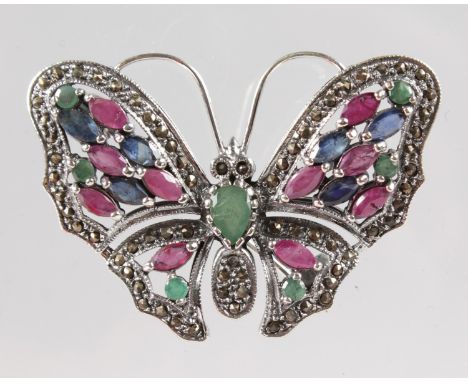 A SILVER, RUBY, EMERALD, SAPPHIRE AND MARCASITE BUTTERFLY BROOCH.