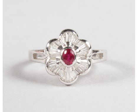 AN 18CT WHITE GOLD, RUBY AND DIAMOND BAGUETTE RING.