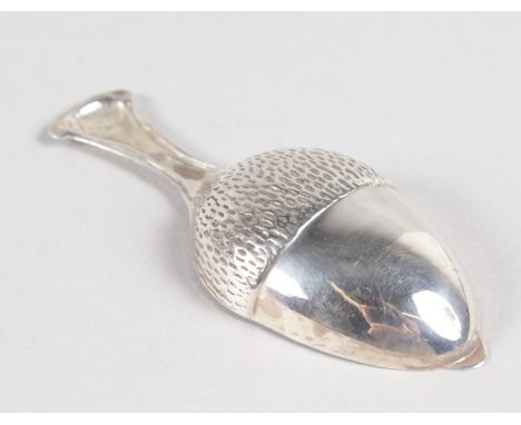 A SILVER NOVELTY ACORN CADDY SPOON.