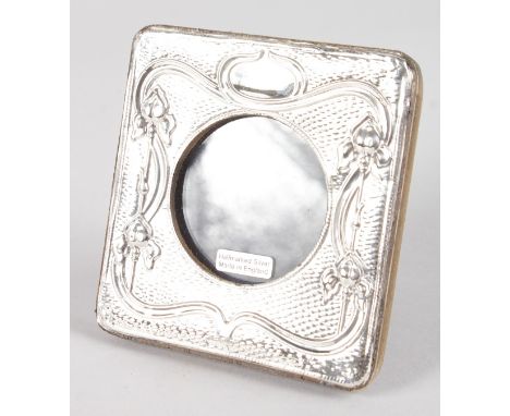 A SMALL ART NOUVEAU SILVER PHOTOGRAPH FRAMES, stamped .925. 4ins x 4ins.