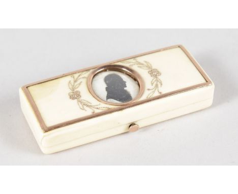 A GEORGE III RECTANGULAR PATCH BOX, the lid with a silhouette signed Miers, the inside with a mirror. 6cms long.