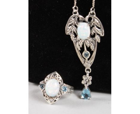 A SILVER, BLUE TOPAZ AND GILSON OPAL RING AND NECKLACE.