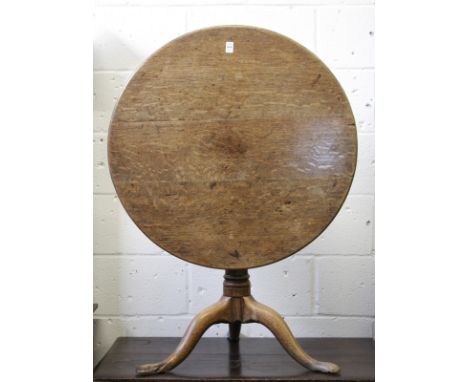 A GEORGE III OAK TILT TOP TRIPOD TABLE, with bird cage movement. 2ft 6ins diameter x 2ft 1ins high.