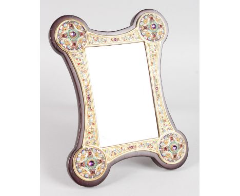 A FINE RUSSIAN "FABERGE" SILVER GILT AND ENAMEL SHAPED PHOTOGRAPH FRAME. 9ins high, 7ins wide.