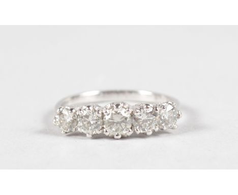 AN 18CT WHITE GOLD FIVE STONE DIAMOND RING of 1.1cts.