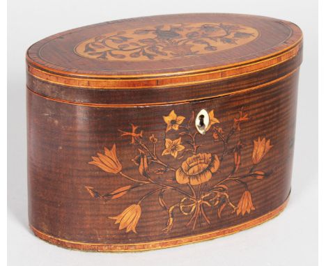 A VERY GOOD GEORGE III OVAL TEA CADDY with crossbanded top with large floral oval and inlaid flowers to the front.  7.25ins w