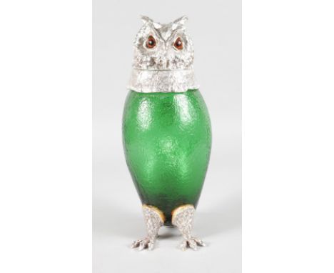 A SILVER PLATED OWL DECANTER.