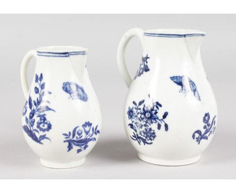 AN 18TH CENTURY WORCESTER SPARROW BEAK JUG, printed with the Three Flowers pattern in underglaze blue, another smaller in Thr