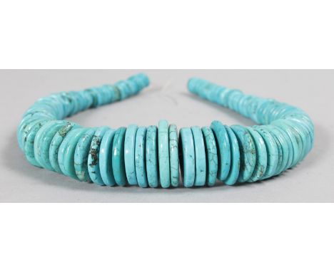 AN ISLAMIC LIGHT BLUE BEAD NECKLACE. 19.5ins long.