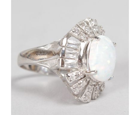 A LOVELY SILVER, GILSON OPAL AND BRILLIANT DRESS RING.