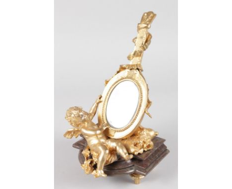 A 19TH CENTURY FRENCH ORMOLU AND MARBLE MIRROR in the form of a cupid holding a guitar, on a shaped marble base. 12ins high.