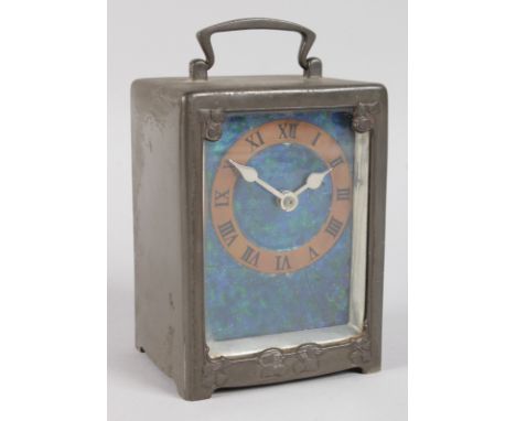 A TUDRIC PEWTER LIBERTY & CO CARRIAGE CLOCK by ARCHIBALD KNOX, Numbered 0721, CIRCA. 1903, with vibrant blue and green enamel