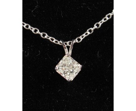 A 14CT WHITE GOLD DIAMOND PENDANT, 80 points on a fine chain.