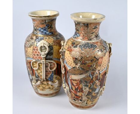 A pair of Japanese Meiji period Satsuma style baluster vases with applied tassel mouldings, decorated with dignitaries in gil
