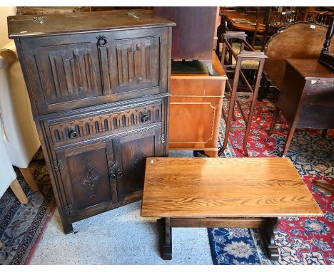 An Ercol linenfold design drinks cabinet to/with a coffee table (2)