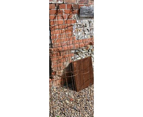A pair of weathered steel arrow-head garden obelisks, approx. 160 cm high x 27 cm diameter 