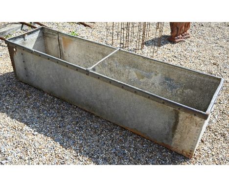 A galvanized riveted steel rectangular trough of planter, 188 cm wide x 48 cm depth x 44 cm high&nbsp;