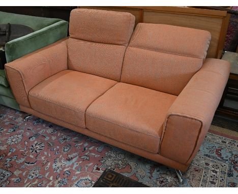 A contemporary Italian Natuzzi box arm sofa with variegated orange and grey fabric upholstery on a tubular chromed frame, 175