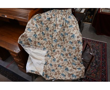 A pair of vintage floral chintz curtains, the cream ground with botanical blue and brown design&nbsp;