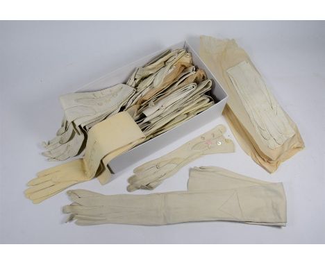 Quantity of 19th century and later white kid gloves, various sizes, including opera, evening, day, some unwornGenerally good 