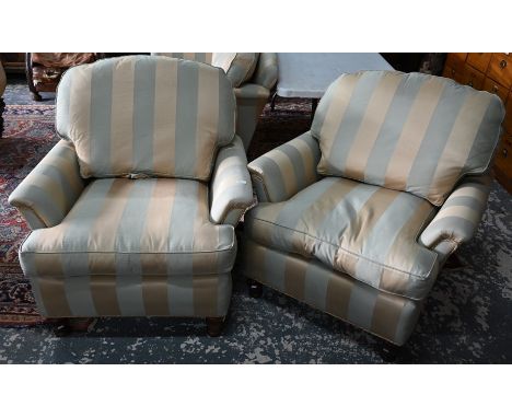 A pair of Duresta armchairs upholstered in pale gold/teal stripe (match to sofa lot 573)