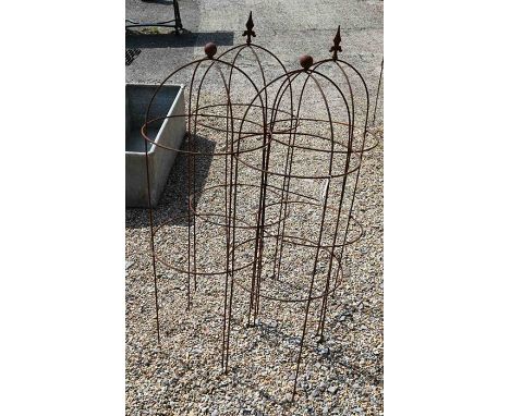 A pair of weathered steel arrow-head garden obelisks to/w a pair of ball-head garden obelisks, approx. 120 high x 43 cm diame