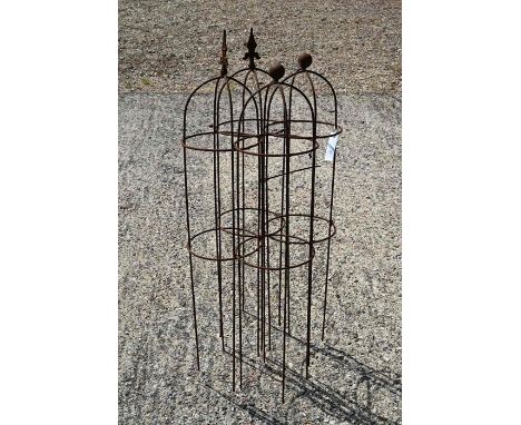 A pair of weathered steel arrow-head garden obelisks to/w a pair of ball-head garden obelisks, approx. 105 high x 23 cm diame
