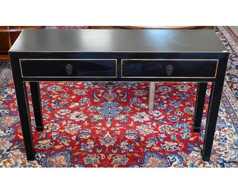 An Oriental black lacquer console table with two frieze drawers, 120 cm wide x 35 cm deep x 78 cm high
