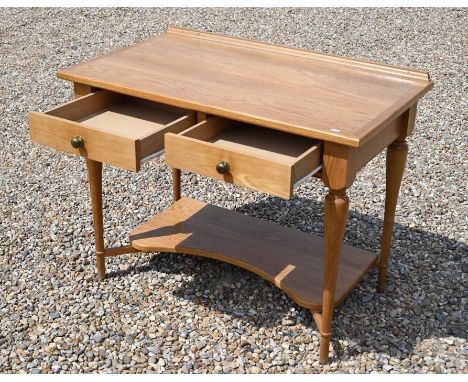 A modern light oak two drawer hall table to/with a matching oak shelf (2)