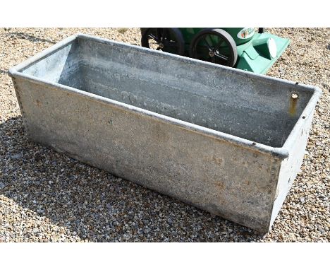 A large galvanized rail-top rectangular trough or planter with riveted panels, 124 cm wide x 48 cm depth x 40 cm high
