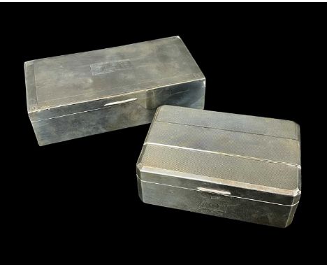 TWO 1950s SILVER CIGARETTE BOXES, George VI and Elizabeth II, engine turned decoration, one with initial 'A' to lid, 18cm and