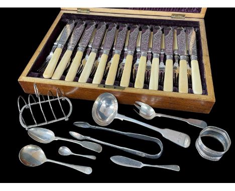 ASSORTED SILVER comprising cased set of twelve engraved fish knives and forks, silver four section toast rack, silver ladle, 