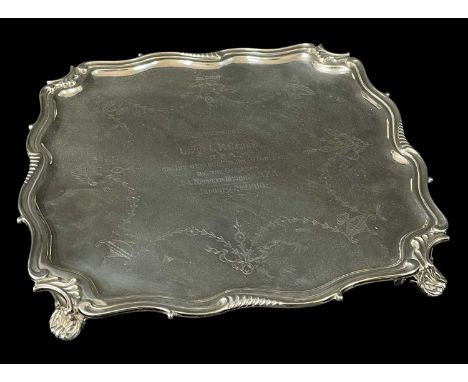 GEORGE V SILVER SALVER, Walker &amp; Hall, Sheffield 1916, shaped square on four shell bracket feet, engraved presentation in