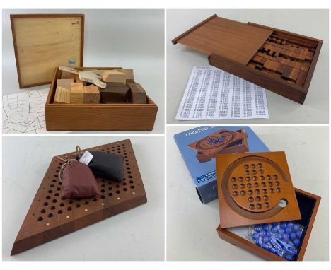 FOUR WOOD GAMES, comprising Italian 'Legnomagia' specimen wood puzzle, and a cube construction puzzle by Bill Cutler, with so