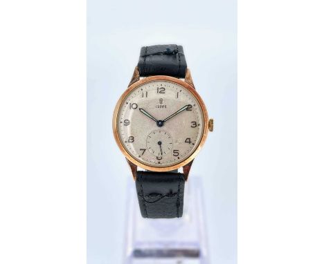 9CT GOLD TUDOR GENTLEMANS WRISTWATCH, c. 1957, 15J manual wind movement, champagne dial with applied gilt arabic numerals, su