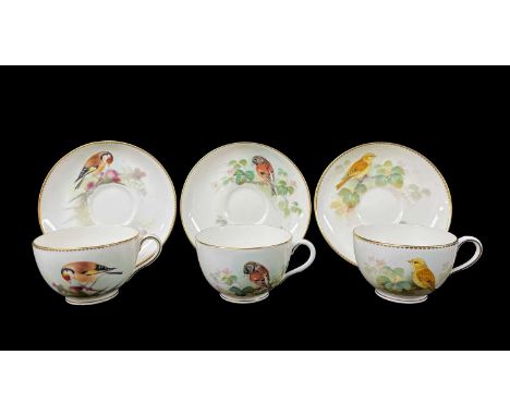 THREE ROYAL WORCESTER HAND-PAINTED CUPS & SAUCERS, decorated with Brambling, Yellow Bunting and Goldfinch, all signed 'Powell